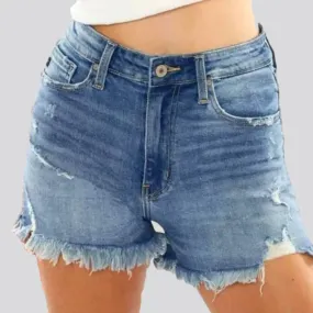 Distressed light-wash women's jeans shorts